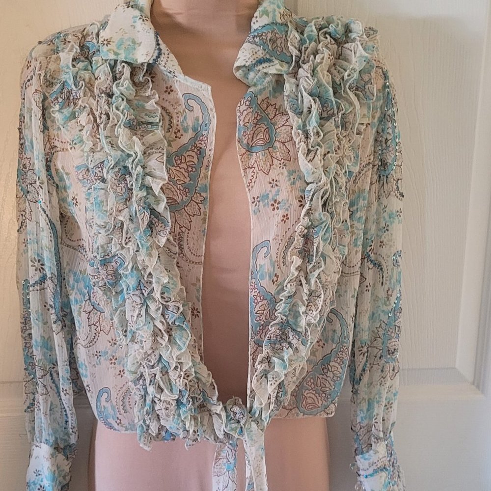 Chaudry ruffled open front tie waist shirt